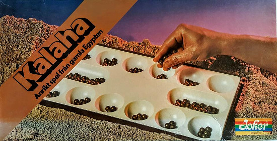 This mancala game from c. 1980 was marketed as a game from ancient Egypt. Therefore the art director painted some guy's arm brown and photographed the game in a pile of sand.