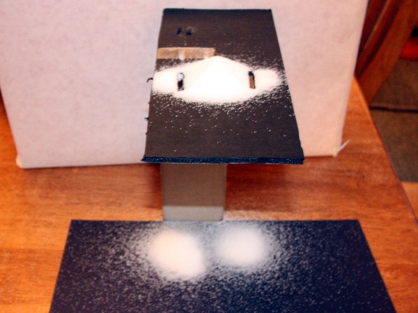 Experimental set-up for the double-slit experiment with classical particles (salt crystals).