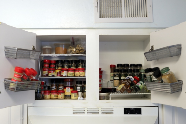 Jury-rigged extra shelves for the spice cabinet.