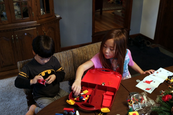 SteelyKid helping the Pip make his Lego firefighter set.