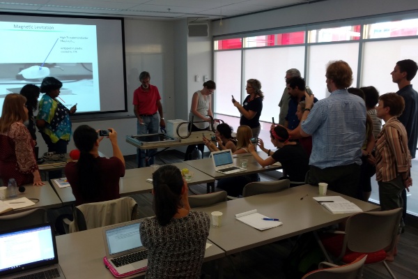 Steve Rolston and Emily Edwards of JQI doing demos at the Schrodinger Sessions workshop.