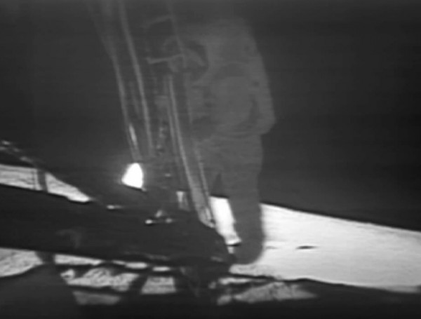 Armstrong descending to take the first steps on the Moon