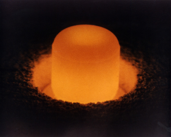 Image credit: Plutonium-238 oxide pellet glowing from its own heat; U.S. Department of Energy.