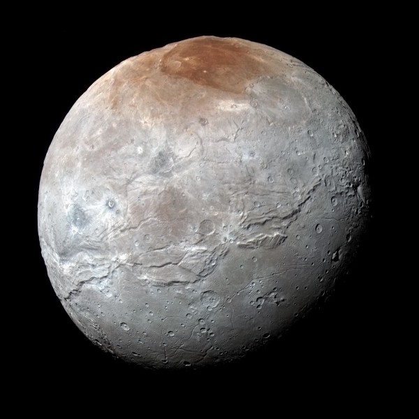 Image credit: NASA/Johns Hopkins University Applied Physics Laboratory/Southwest Research Institute, of Charon in slightly enhanced color.