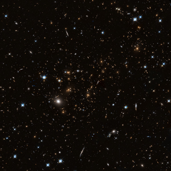 Image credit: NASA / STScI, of cluster MACS J0717.5+3745 in the optical, courtesy of Hubble Frontier Fields.
