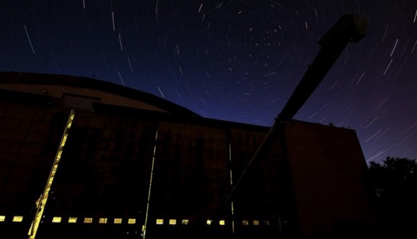 Image credit: Chris Luckhardt at flickr, of a long-exposure photograph of the stars from Earth.