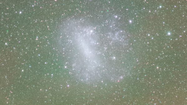 One of the few galaxies -- the Large Magellanic Cloud -- as visible from Earth. The faint background light comes from Earth's atmosphere. Image credit: Y. Beletsky (LCO)/ESO.