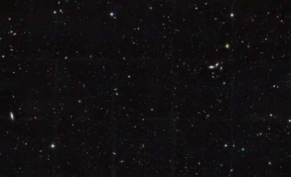 Image of the HST GOODS-South field, one of the deepest images of the sky but covering just one millionth of its total area. Image credit: NASA / ESA / The GOODS Team / M. Giavalisco (UMass., Amherst).