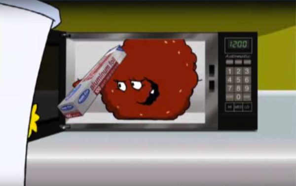 Shake: 'Here, read this book.' Meatwad: 'Do not use in microwave oven.' Image credit: Adult Swim/Aqua Teen Hunger Force.
