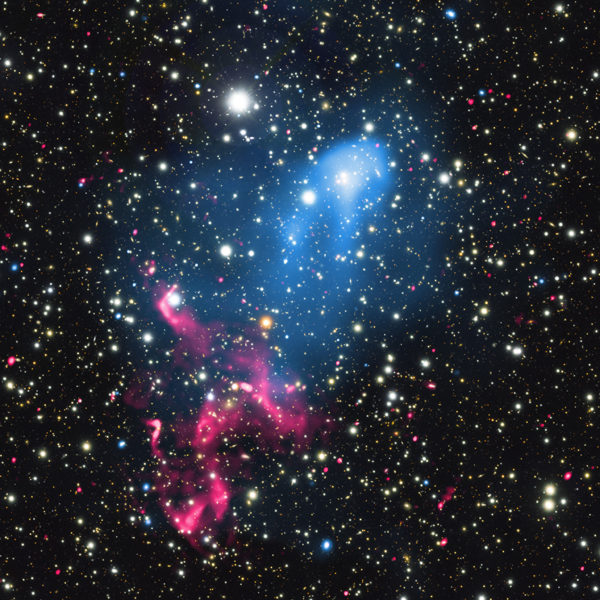 Combined X-ray, Radio & Optical Images of Abell 3411 and Abell 3412. Images credit: X-ray: NASA/CXC/SAO/R. van Weeren et al (blue); Optical: NAOJ/Subaru (white); Radio: NCRA/TIFR/GMRT (red).