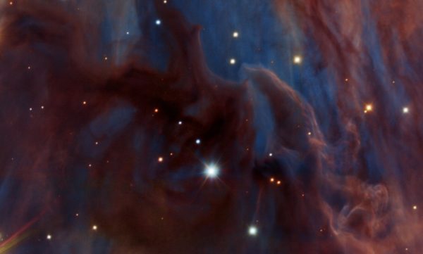 The dusty regions that visible-light telescopes cannot penetrate are revealed by the infrared views of ESO's HAWK-I instrument, showcasing the sites of new and future star formation where the dust is densest. Image credit: ESO / H. Drass et al.