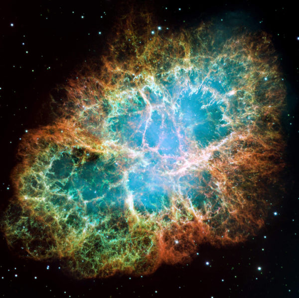 An optical composite/mosaic of the Crab Nebula as taken with the Hubble Space Telescope. The different colors correspond to different elements, and reveal the presence of hydrogen, oxygen, silicon and more, all segregated by mass. Image credit: NASA, ESA, J. Hester and A. Loll (Arizona State University).