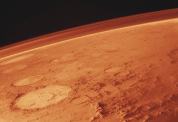 Mars, along with its thin atmosphere, as photographed from the Viking orbiter in the 1970s. Image credit: NASA / Viking orbiter.