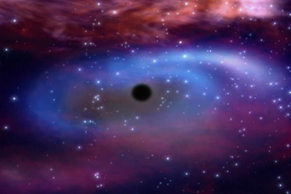 This illustration of a black hole, surrounded by X-ray emitting gas, showcases one of the major ways black holes are identified and found. Based on recent research, there may be as many as 100 million black holes in the Milky Way galaxy alone. Image credit: ESA.